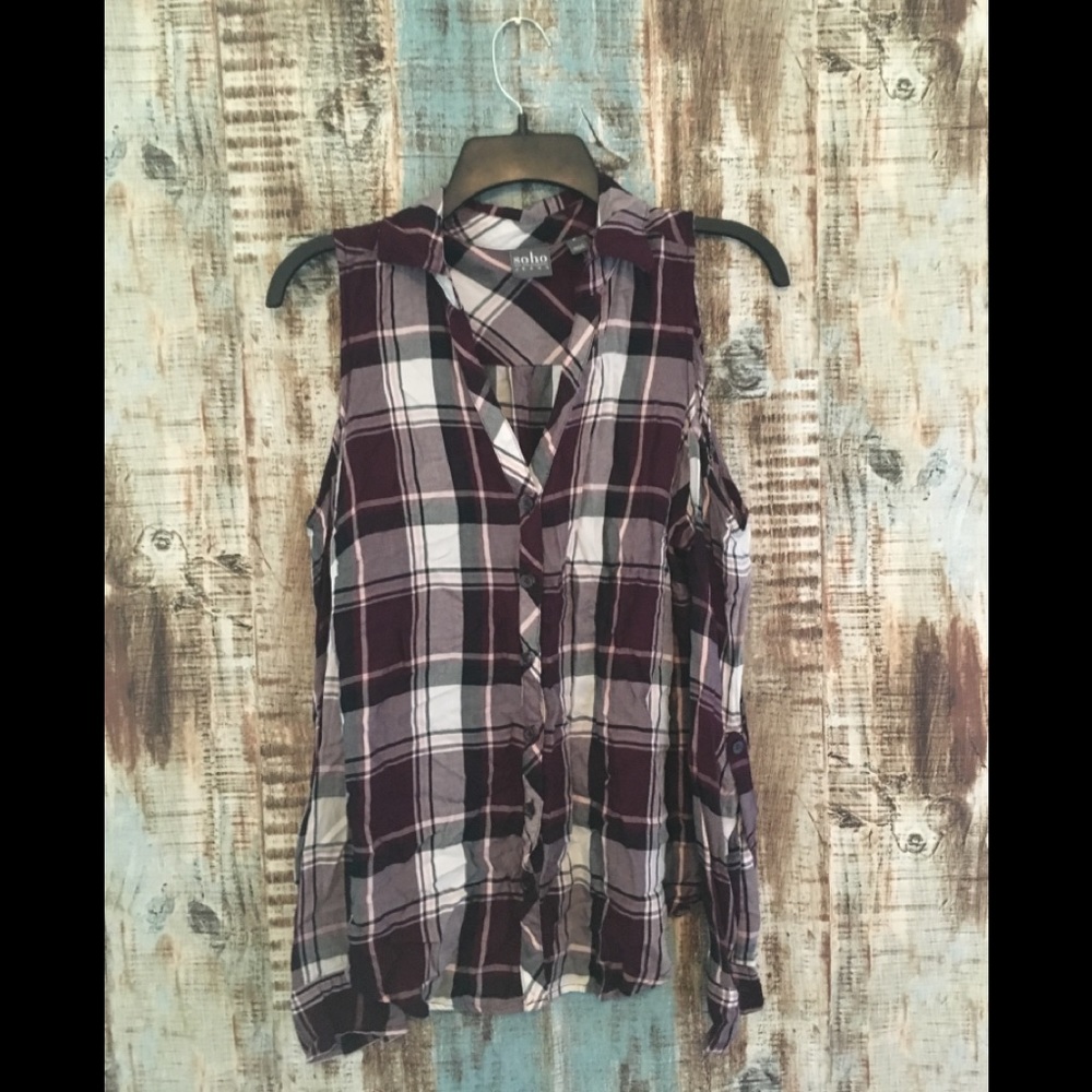 Long sleeved blouse with cut out shoulders